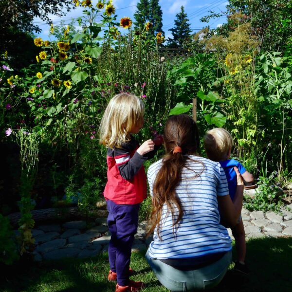 Kids checking out the garden at the Riverdale cider pressing August 2024