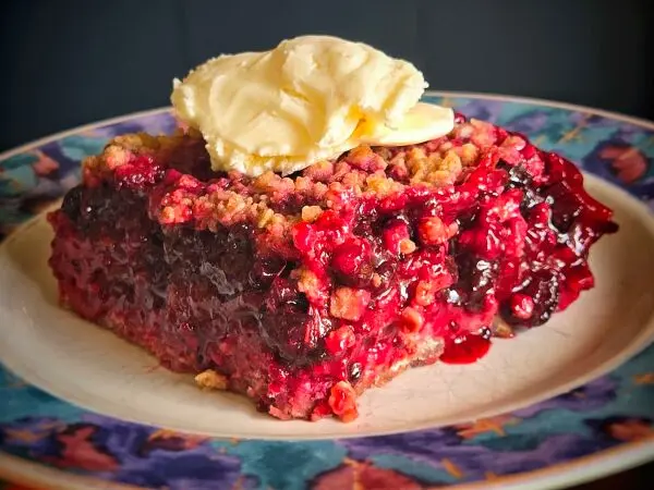 This Rhubarb Haskap Crisp Adapts All Year — Here’s How to Make It 1 Rhubarb Haskap Crisp Served on a Plate with Ice Cream