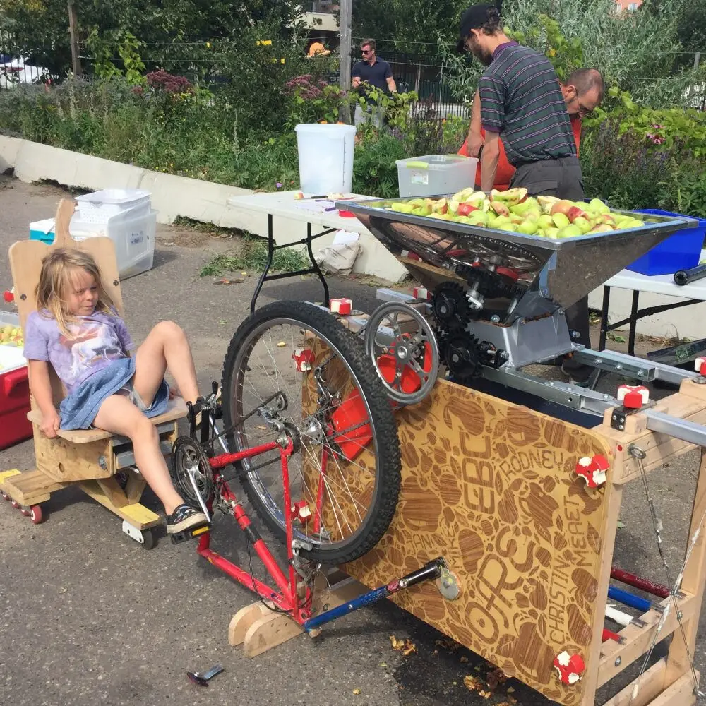 Young Girl Crushes Apples With the Apple Annihilator